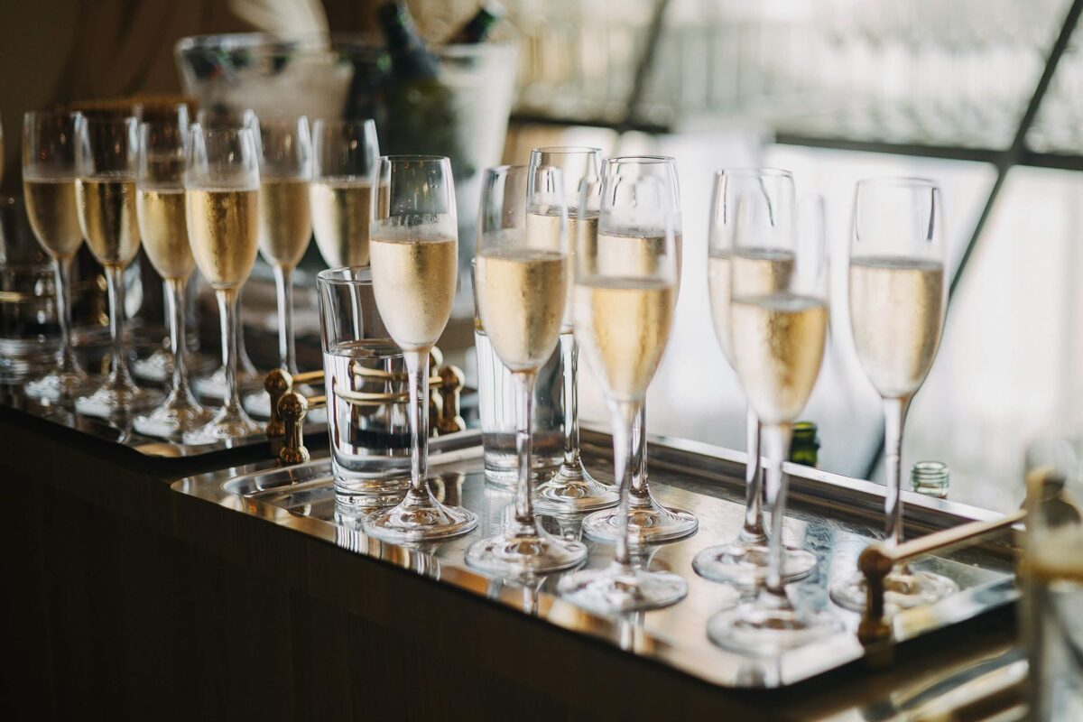a tray of sparkling wine glasses ready to serve