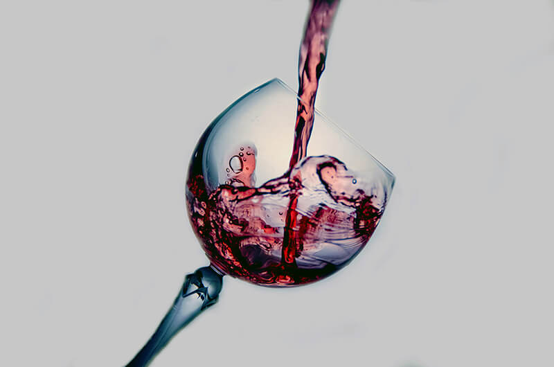 red wine poured into a glass