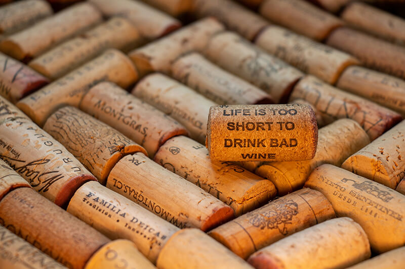 a bunch of wooden wine corks